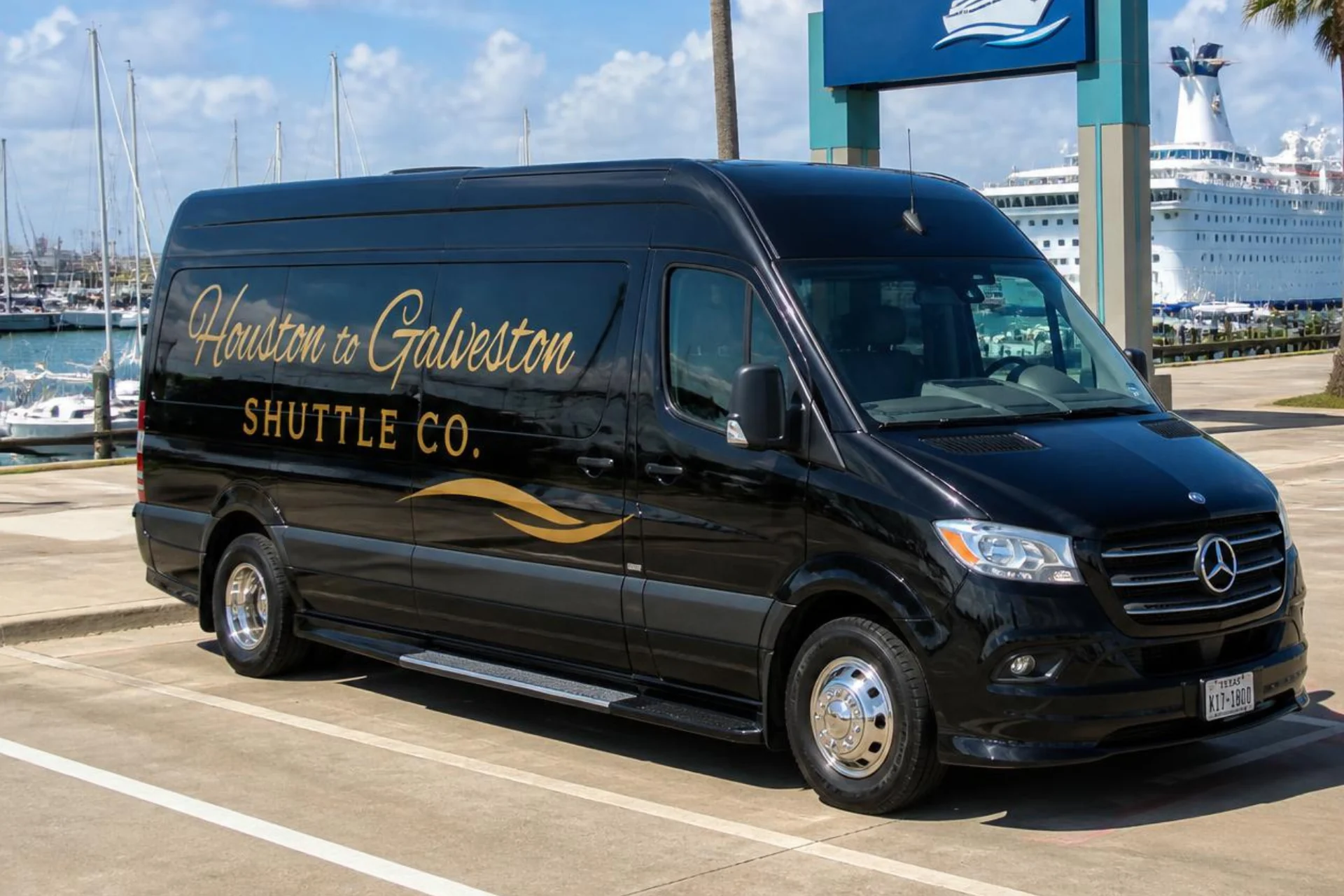 Houston to Galveston Shuttle Co. Sprinter at the Galveston harbor with a cruise ship docked behind
