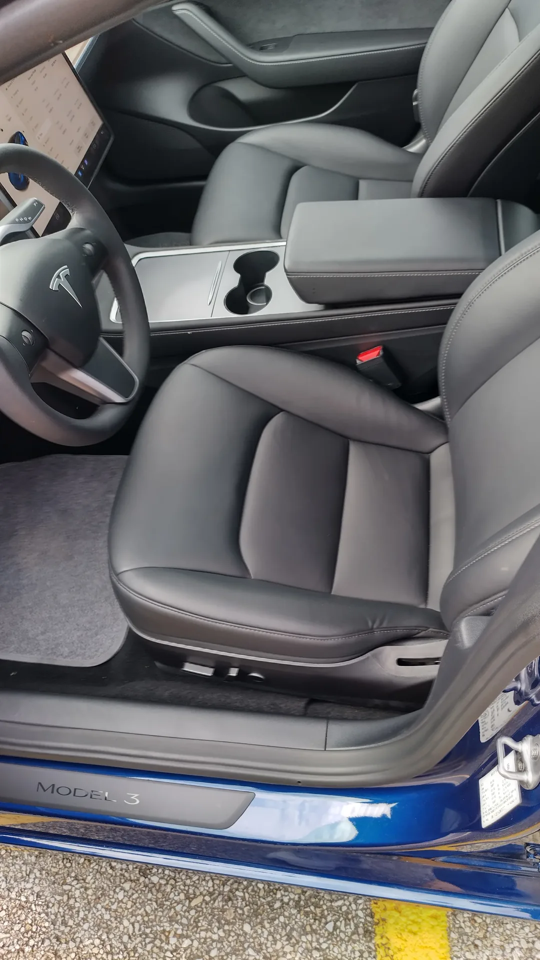 Front cabin and centre console of the Tesla Model 3 sedan